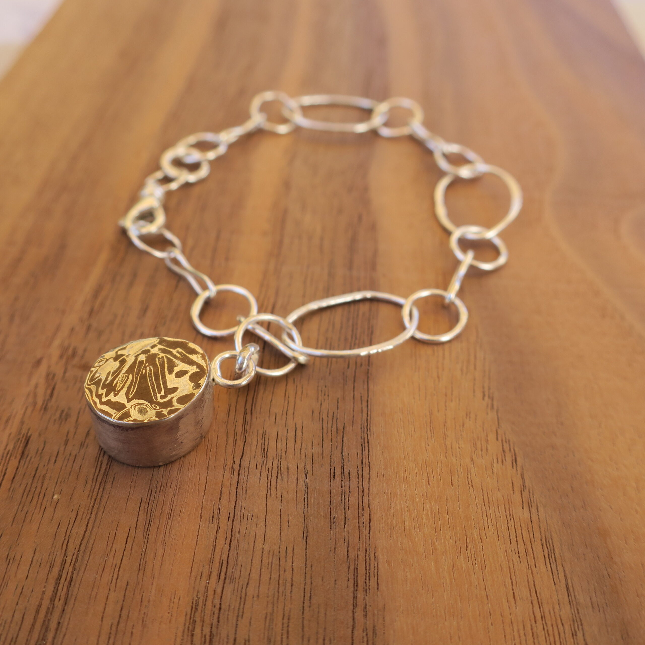 Mokumegane charm with silver chain bracelet